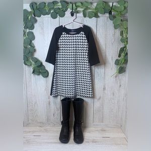 like New. Girls Gap dress; sz 6; color black and white. $45 retail.